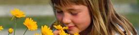 Photo: Girl Sniffing Flowers