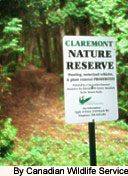 Image of Acknowledgement sign marking the Almack's donation as the Claremont Nature Reserve / By Canadian Wildlife Service