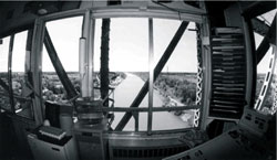 Photo 7. Looking south from inside bridge operator control room with bridge in fully raised position (using fish-eye camera lens).
