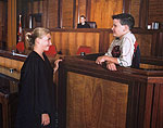 Photo - Mock trial with three students