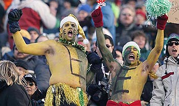 Football keeps them warm: Fans celebrate prior to the 2003 Grey Cup final between the Edmonton