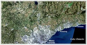 Fig 1: Image du capteur TM de l'agglomration de Toronto mettant en vidence une distinction entre les zones urbanises, le Grand Toronto et les terres agricoles avec les tracs des labours. La Moraine d'Oak Ridges est marque par une bande de couverture forestire de direction est-ouest dbutant  l'est d'Aurora et allant jusqu' l'est du lac Scugog.