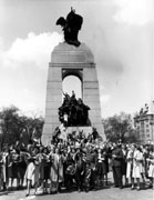 Crowds celebrating VE-Day in front of National War Memorial, Ottawa, ON, 8 May 1945 Credit: National Archives of Canada/DND Army 2-3848-47