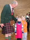 George Cole, a veteran of the Second World War, shares memories with some young fans!PHOTO CREDIT: Courtesy of Jessica Humphreys, 2003