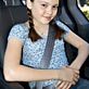 Child with regular seatbelt properly secured