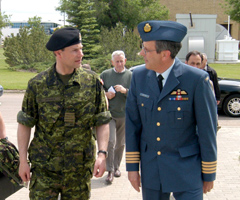 His Royal Highness Prince Edward, The Earl of Wessex, is greeted upon his arrival at the airbase by 15 Wing Commanding Officer Colonel Alain Boyer. (Photo by Sgt JFC Senecal)