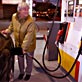 Woman filling fuel tank
