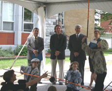 From left to right Gaston Lemay, President of lAssociation du transport colier du Qubec; Alexandre Iraca, Vice-President, la Commission scolaire au Coeur-des-Valles; Lawrence Cannon, Minister of Transport, Infrastructure and Communities and Natalie Sarafian, Press Secretary to Minister Cannon.
