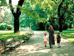 Woman and children walking in park - Photo Credit: Corel Corporation