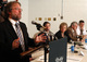 Dr. Richard Kurial, Chair of the Task Force on Student Achievement, speaks at the news conference to release the task force report.  With him are from left: Premier Pat Binns; Education Minister Mildred Dover; Dr. Alex (Sandy) MacDonald, superintendent of the Eastern School District and task force member; and Rob MacDonald, Colonel Gray High School math teacher and task force member

