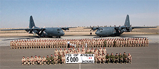 Reaching 5000 hours is a group effort as seen by this photo on the flight line at Camp Mirage.