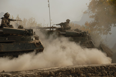 25 October 2007 - Zharey, Afghanistan : Engineers use Badgers (armored engineer vehicles) to flatten an area conducive to attacks near a forward operating base.
