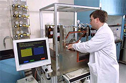 DNA synthesis. Genomics research involves not only sequencing (determining the genetic code of DNA), but also in constructing DNA sequences. Undertaking DNA synthesis requires a special DNA sequencing machine such as that use here.