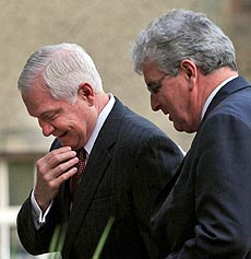 British Defence Secretary Des Browne, right, and U.S. Defence Secretary Robert Gates arrive at the British Army Headquarters in Edinburgh, Scotland, on Friday, for two days of meetings with allies in the Afghanistan war.