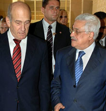 Israeli Prime Minister Ehud Olmert, left, and Palestinian Authority President Mahmoud Abbas, right, seen earlier this year, have pledged to work toward a peace agreement.