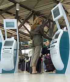 Air Canada passengers can currently use electronic kiosks, like these seen here, to check in and generate boarding passes.