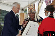 2006-06-21 - Premier Gordon Campbell celebrated the 10th annual National Aboriginal Day in Vancouver, presenting a commemorative certificate to members of the Haisla First Nation at a ceremony celebrating the repatriation of a Haisla totem pole that had been in Sweden since 1929.