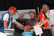 Vancouver on July 5, 2003 to celebrate Canada's win of the 2010 Winter Games. From left to right: Vancouver Mayor Larry Campbell; Premier Campbell; Heritage Minister Sheila Copps; Maria Uhrynchuk, the winner of two tickets to the Games opening ceremonies in 2010; and Squamish Chief Gibby Jacob.

