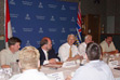 Premier Gordon Campbell and area MLAs Kevin Krueger (Kamloops-North Thompson, left of the Premier) and Claude Richmond (Kamloops, right of the Premier) meet with members of the Kamloops small business community on June 21, 2002.