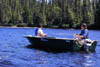 Family fishing on a lake