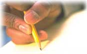 photo of hand with pencil