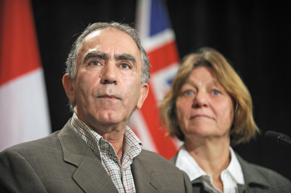 With his wife Kate by his side, Greg Sorbara announces his resignation as Ontario finance minister at Queen's Park on Oct. 26, 2007. 