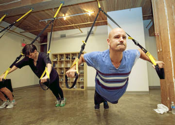 Tenma Fruitman and Simon Benstead do some strap-hanging at Get Spun in Toronto.