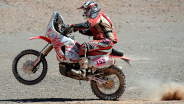 Canada's Patrick Trahan rides his Honda during the 5th stage of the Dakar 2010 between Copiapo and Antofagasta, Chile, on January 6, 2010. Chile's Francisco Lopez Contardo won the stage, France's Cyril Despres took the second place and leads the race and France's David Fretigne the third. Casteu, who was second this morning, broke his leg during this stage.