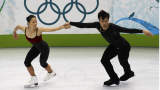 China's Shen Xue (L) and Zhao Hongbo train in preparation for the figure skating competition at the Vancouver 2010 Winter Olympics February 9, 2010.