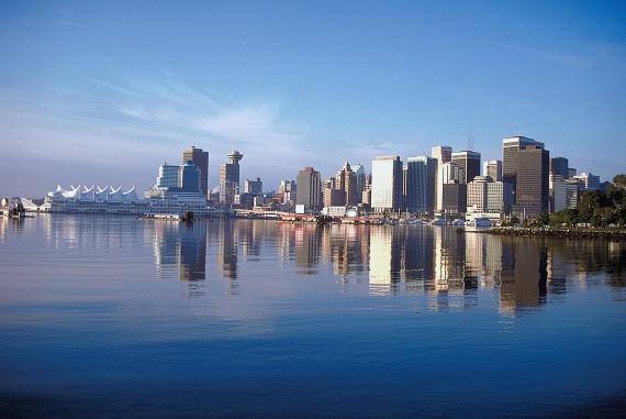 Photo – Vancouver’s financial district reflecting in the water