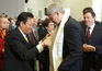 Prime Minister Stephen Harper is presented with a Khata, a traditional ceremonial scarf symbolizing purity and compassion, from the Tibetan community following an announcement establishing the Office of Religious Freedom. February 19, 2013. (Photo by Jason Ransom)