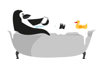 Percy Penguin using his smartphone while taking a bath.