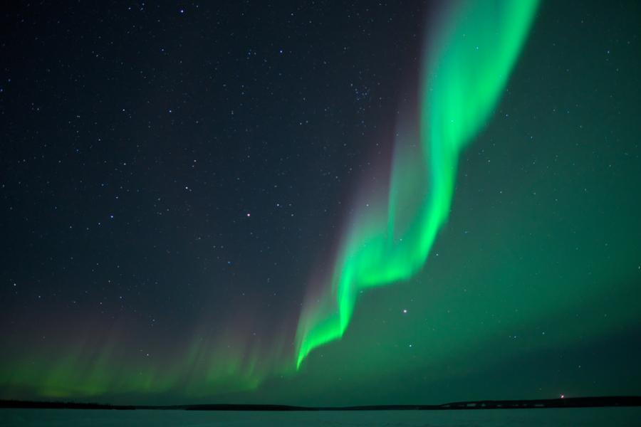 Aurora borealis light up the night over Waterbury Lake in northern Saskatchewan